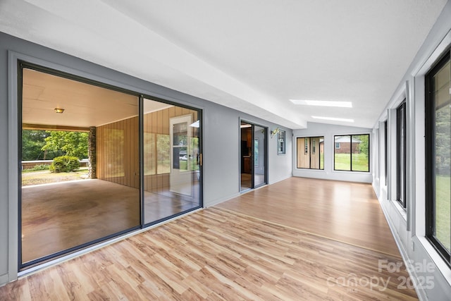 18 Progress Ln, Candler, NC 28715 - unfurnished sunroom featuring a skylight and vaulted ceiling