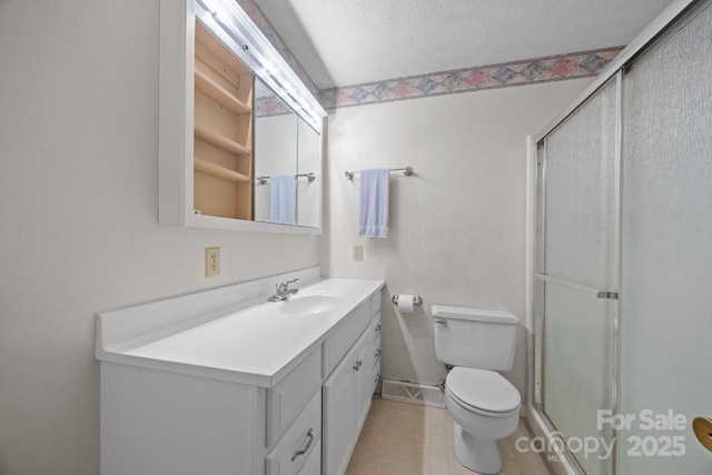 18 Progress Ln, Candler, NC 28715 - full bathroom featuring vanity, a shower stall, a textured ceiling, and tile patterned floors