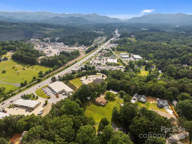 18 Progress Ln, Candler, NC 28715 - aerial view of a mountain backdrop and a heavily wooded area