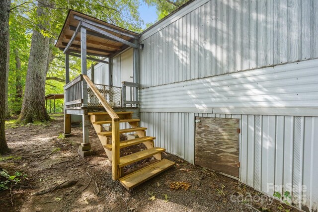 18 Progress Ln, Candler, NC 28715 - view of side of property with stairway and a deck