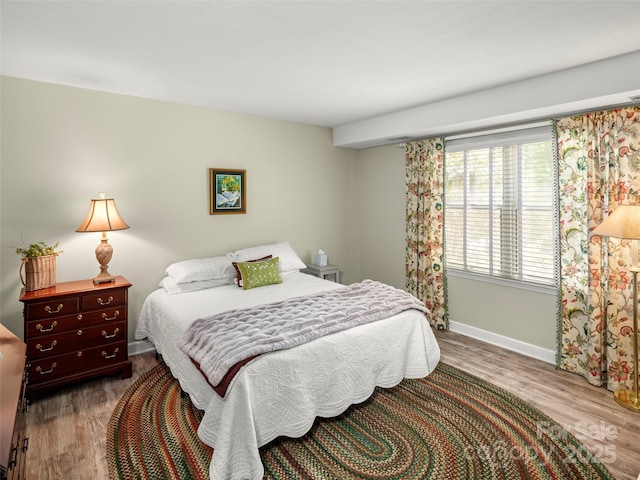 64 Wells Ln, Tryon, NC 28782 - bedroom with wood finished floors and baseboards