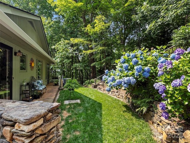 64 Wells Ln, Tryon, NC 28782 - view of green lawn with a wooden deck