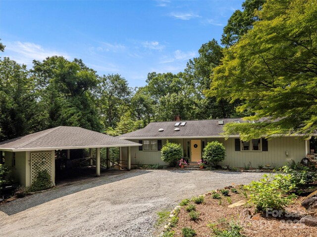 64 Wells Ln, Tryon, NC 28782 - ranch-style home featuring driveway and a carport