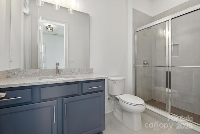 1106 Pomar Cir, Waxhaw, NC 28173 - bathroom featuring vanity, a stall shower, and tile patterned floors