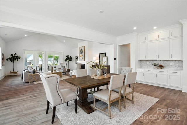 1106 Pomar Cir, Waxhaw, NC 28173 - dining room featuring light wood-style floors, vaulted ceiling, and recessed lighting