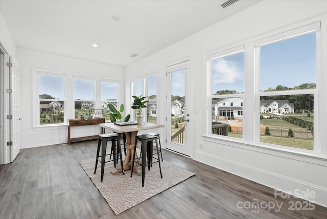 1106 Pomar Cir, Waxhaw, NC 28173 - sunroom / solarium featuring wood finished floors and recessed lighting