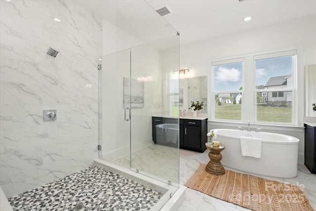 1106 Pomar Cir, Waxhaw, NC 28173 - full bathroom with marble finish flooring, a marble finish shower, vanity, and a soaking tub