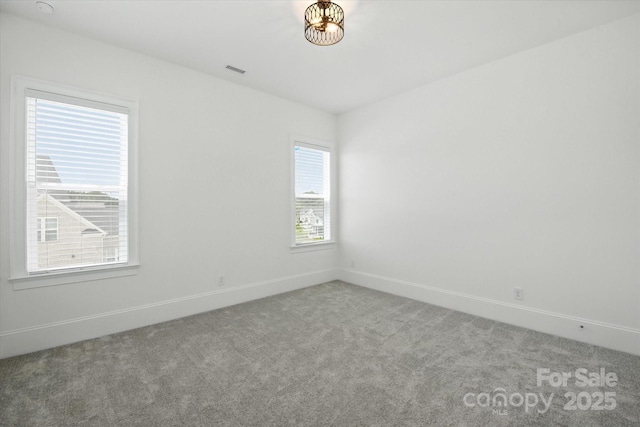 1106 Pomar Cir, Waxhaw, NC 28173 - carpeted empty room featuring baseboards