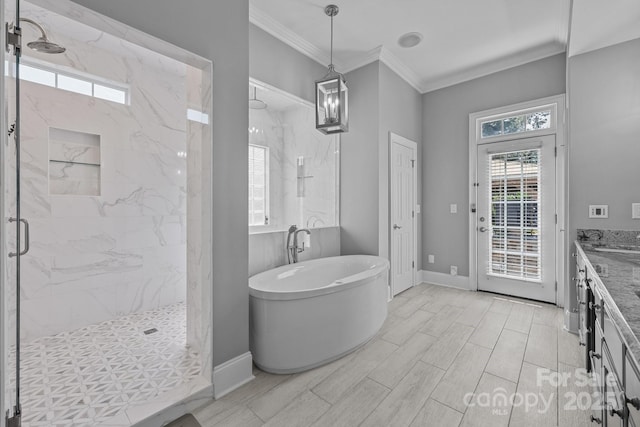 123 Yellow Jacket Cir, Mooresville, NC 28117 - full bathroom with a marble finish shower, a freestanding tub, vanity, and crown molding