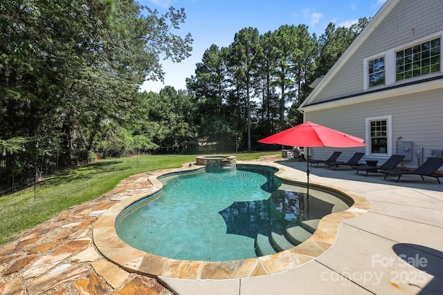 123 Yellow Jacket Cir, Mooresville, NC 28117 - view of pool featuring a patio area, a yard, a pool with connected hot tub, and view of wooded area