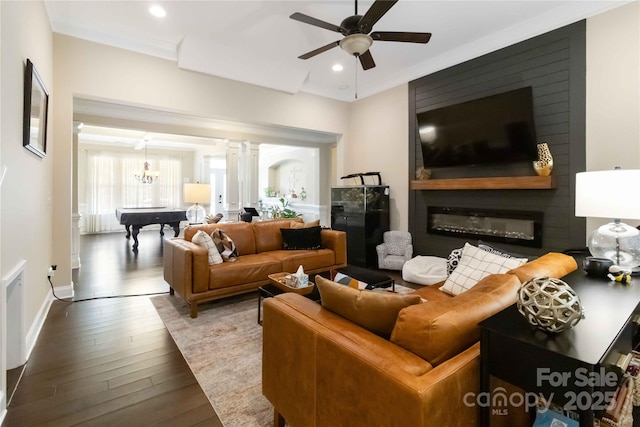 1041 Verbena Ct, Tega Cay, SC 29708 - living area featuring decorative columns, ceiling fan, wood finished floors, and recessed lighting