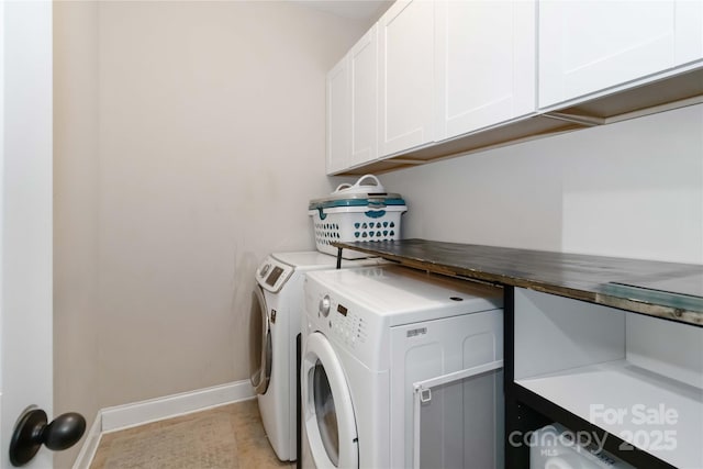1041 Verbena Ct, Tega Cay, SC 29708 - laundry area featuring cabinet space and independent washer and dryer