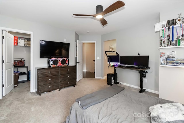 1041 Verbena Ct, Tega Cay, SC 29708 - bedroom with carpet floors, a walk in closet, a ceiling fan, and a closet