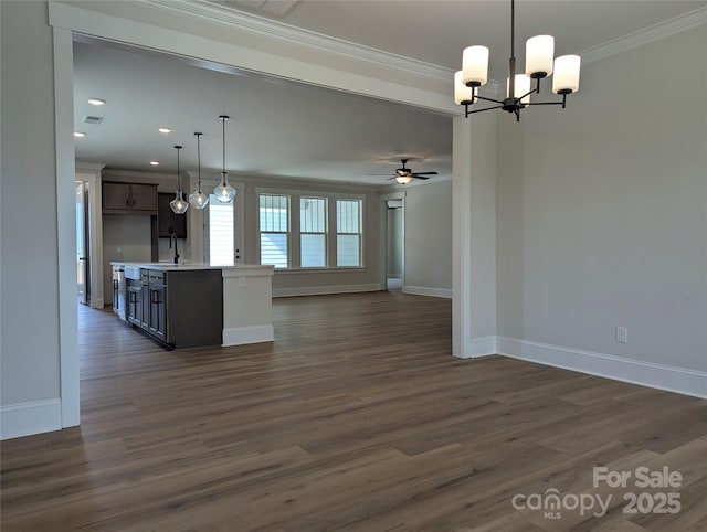 105 Macland Ln Unit 540, Rock Hill, SC 29730 - kitchen featuring ornamental molding, open floor plan, a chandelier, light countertops, and dark wood-style floors