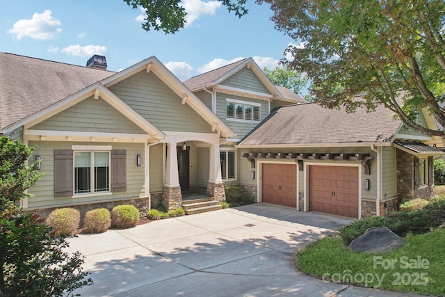 3229 Lake Pointe Dr, Belmont, NC 28012 - craftsman inspired home with a garage, stone siding, a chimney, driveway, and a shingled roof