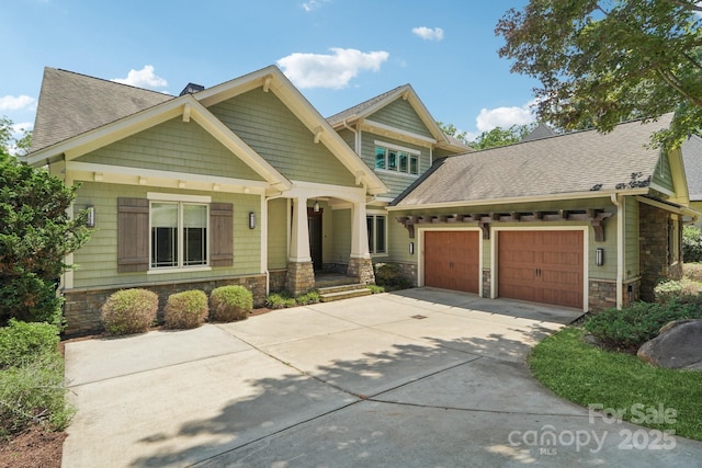 3229 Lake Pointe Dr, Belmont, NC 28012 - craftsman house featuring stone siding, a garage, and driveway