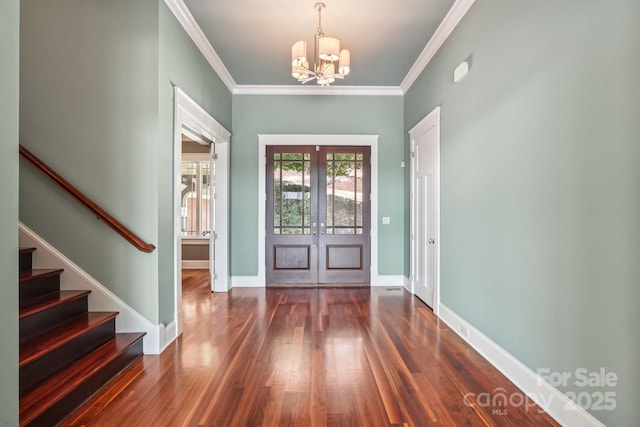 3229 Lake Pointe Dr, Belmont, NC 28012 - entryway featuring french doors, a chandelier, stairs, crown molding, and wood finished floors