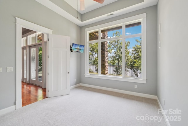 3229 Lake Pointe Dr, Belmont, NC 28012 - spare room featuring carpet, plenty of natural light, and a ceiling fan