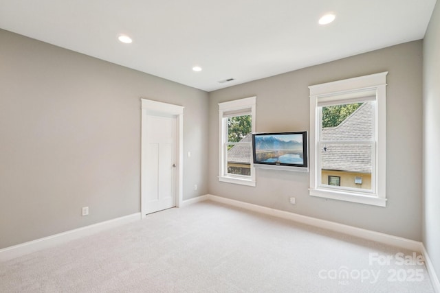 3229 Lake Pointe Dr, Belmont, NC 28012 - spare room featuring light colored carpet and recessed lighting