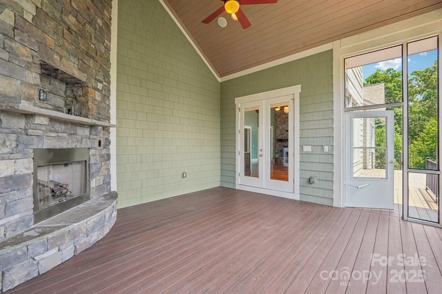 3229 Lake Pointe Dr, Belmont, NC 28012 - wooden terrace with a stone fireplace, french doors, and a ceiling fan