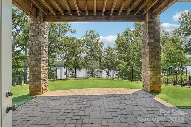 3229 Lake Pointe Dr, Belmont, NC 28012 - fenced backyard featuring a patio and a water view