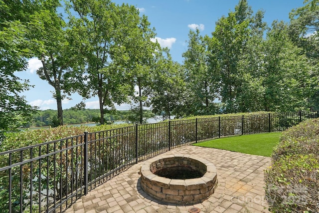 3229 Lake Pointe Dr, Belmont, NC 28012 - view of patio / terrace with an outdoor fire pit and a water view