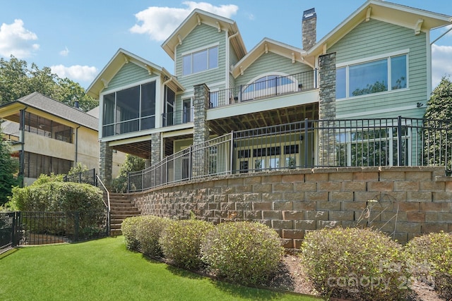 3229 Lake Pointe Dr, Belmont, NC 28012 - rear view of property with stairway, a chimney, a sunroom, and a balcony