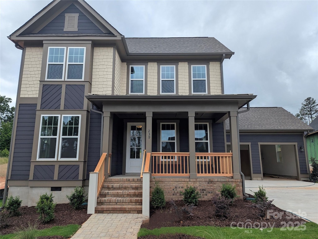 239 Luray Way Unit 438, Rock Hill, SC 29730 - view of front facade with a porch, concrete driveway, and an attached garage