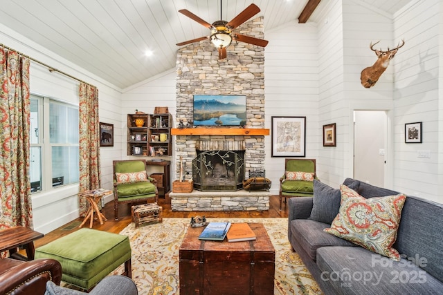 1092 E Bald Rock Dr, Sapphire, NC 28774 - living area with wood finished floors, a ceiling fan, a fireplace, high vaulted ceiling, and wooden walls