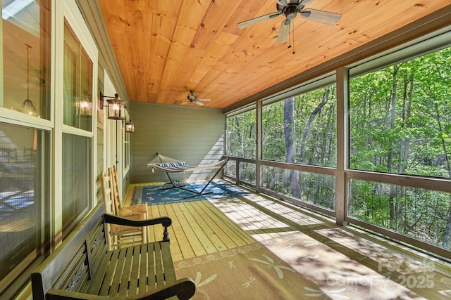 1092 E Bald Rock Dr, Sapphire, NC 28774 - unfurnished sunroom featuring a ceiling fan and plenty of natural light