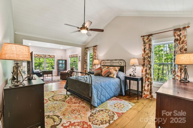 1092 E Bald Rock Dr, Sapphire, NC 28774 - bedroom with wood finished floors and vaulted ceiling