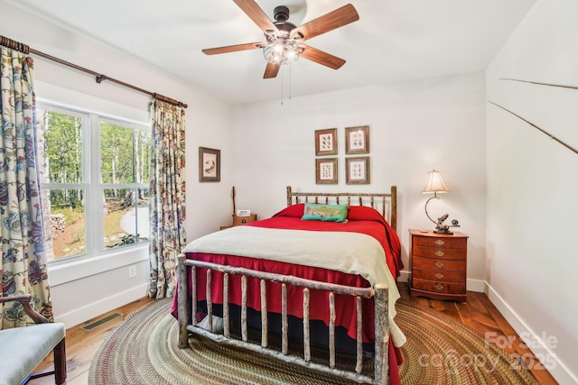 1092 E Bald Rock Dr, Sapphire, NC 28774 - bedroom with wood finished floors and a ceiling fan