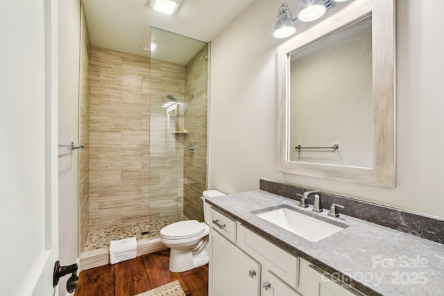 1092 E Bald Rock Dr, Sapphire, NC 28774 - bathroom with vanity, a tile shower, and wood finished floors