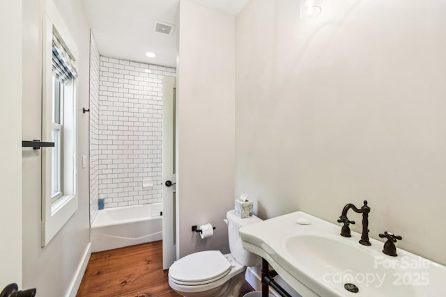 1092 E Bald Rock Dr, Sapphire, NC 28774 - bathroom with wood finished floors, bathing tub / shower combination, vanity, and recessed lighting
