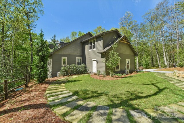 1092 E Bald Rock Dr, Sapphire, NC 28774 - back of property featuring a lawn