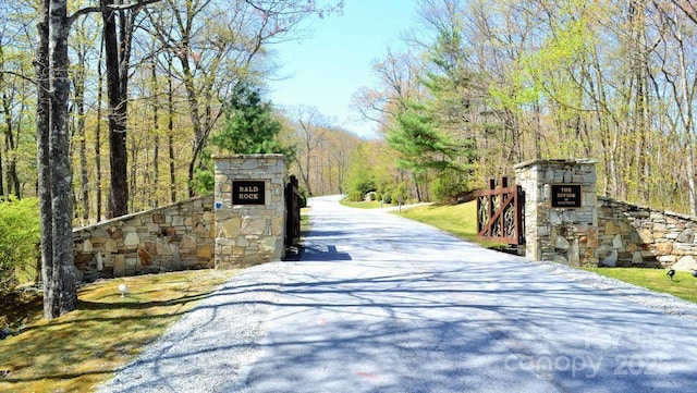 1092 E Bald Rock Dr, Sapphire, NC 28774 - gate featuring a wooded view