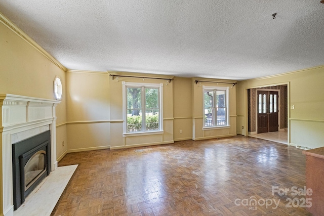 630 Burrage Rd NE, Concord, NC 28025 - unfurnished living room with a textured ceiling, a fireplace, and ornamental molding