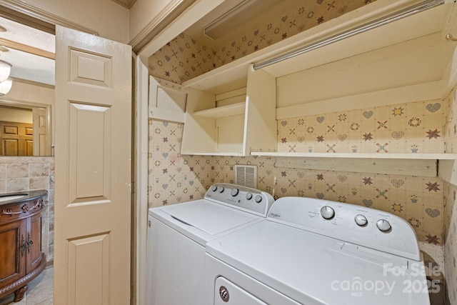 630 Burrage Rd NE, Concord, NC 28025 - washroom with washing machine and dryer and wallpapered walls