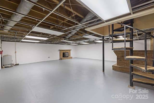 630 Burrage Rd NE, Concord, NC 28025 - finished below grade area featuring a water pressure tank and stairs