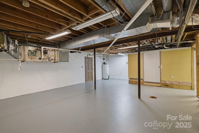 630 Burrage Rd NE, Concord, NC 28025 - unfinished below grade area featuring water heater
