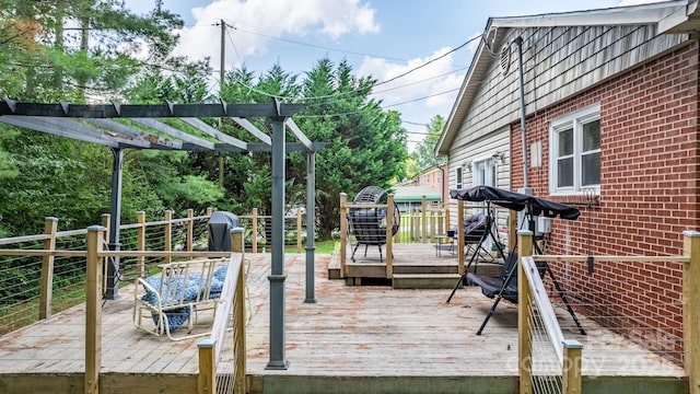 309 Sheldon St, Hudson, NC 28638 - wooden deck with a pergola