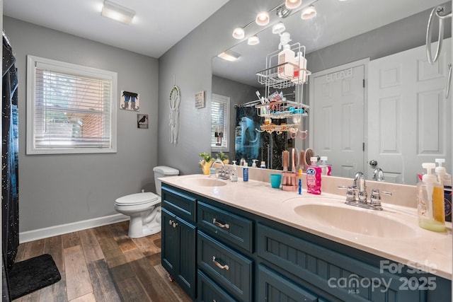 309 Sheldon St, Hudson, NC 28638 - full bath with double vanity, wood finished floors, and a shower with curtain