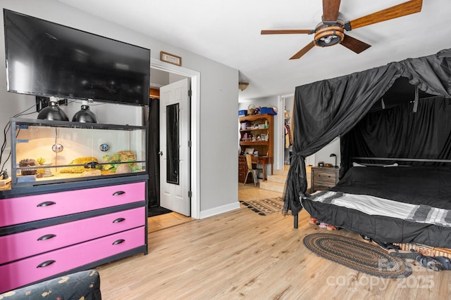 309 Sheldon St, Hudson, NC 28638 - bedroom with wood finished floors and ceiling fan