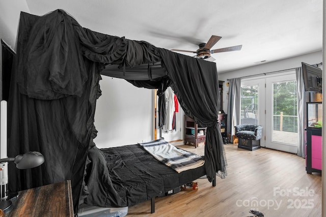 309 Sheldon St, Hudson, NC 28638 - bedroom with access to exterior, wood finished floors, and ceiling fan