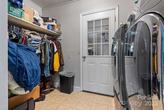309 Sheldon St, Hudson, NC 28638 - laundry room with independent washer and dryer, light tile patterned floors, and ornamental molding