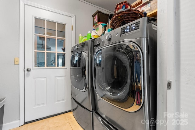 309 Sheldon St, Hudson, NC 28638 - laundry area featuring washer and dryer and light tile patterned floors