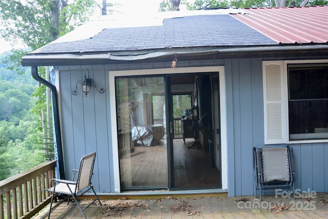 673 Chestnut Ln, Mars Hill, NC 28754 - property entrance with a wooden deck and a metal roof