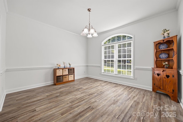 1528 Autumn Brook Ln, York, SC 29745 - unfurnished dining area featuring wood finished floors, a chandelier, and ornamental molding