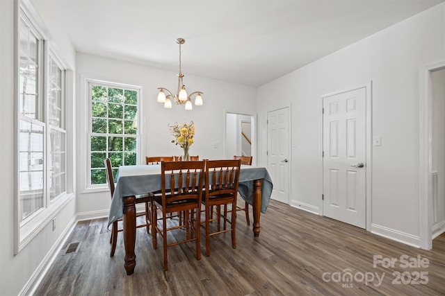 1528 Autumn Brook Ln, York, SC 29745 - dining space with dark wood finished floors and a chandelier