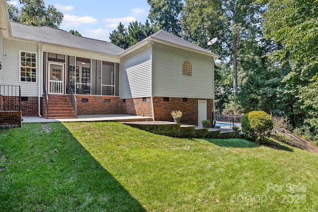 1528 Autumn Brook Ln, York, SC 29745 - rear view of house featuring a sunroom, crawl space, a shingled roof, and a patio